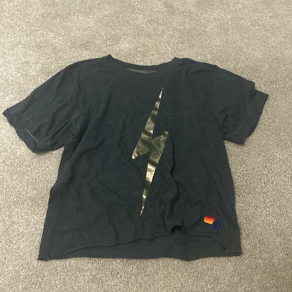 super cute black avatar shirt with lighting bolt size xs. worn a twice with care